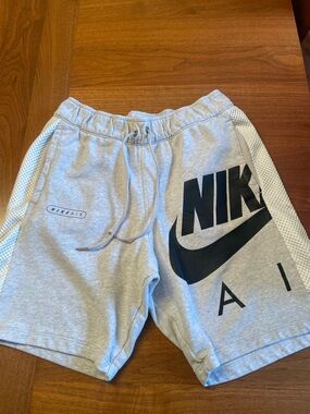 Nike Men’s Gray Athletic Shorts with Black Swoosh